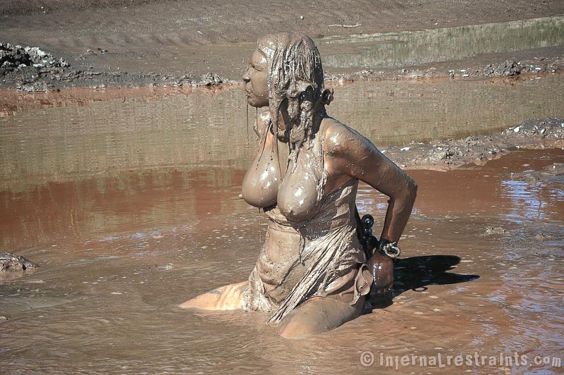 Naked women covered in dirt full size