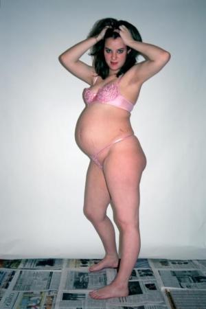Brunette pregnant belly 457X686 jpeg