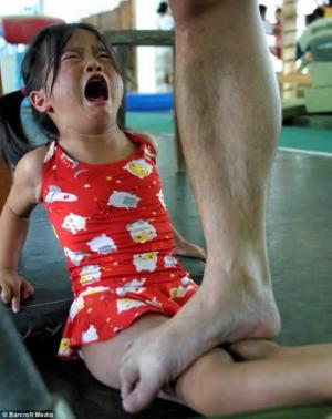 Little girls gymnastic training 555X700 jpeg
