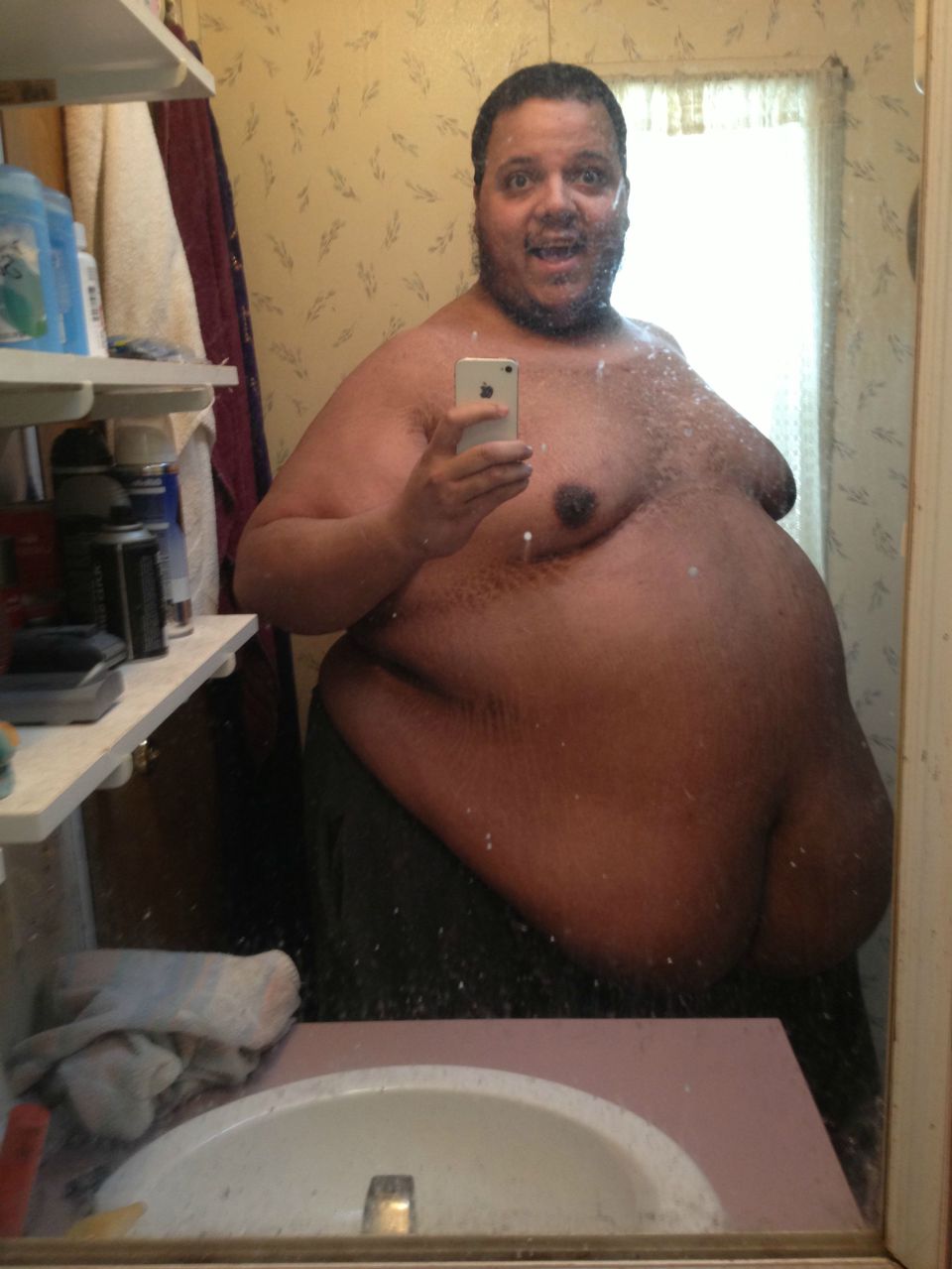 Fat black man selfie full size