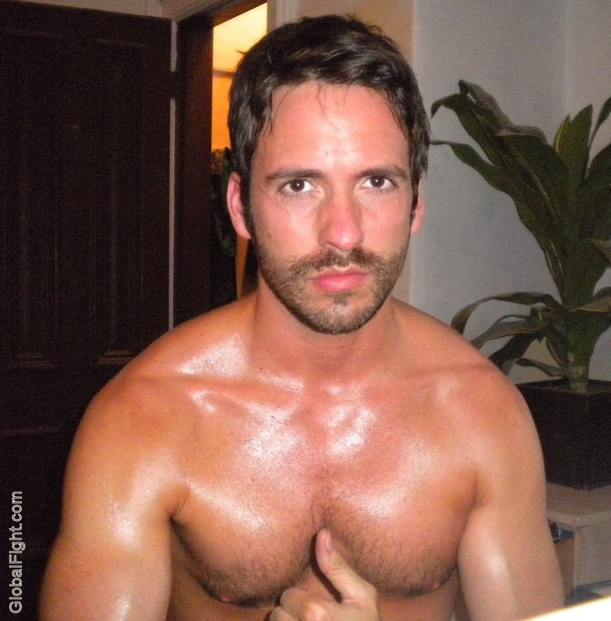 Sweaty nude men wrestling full size