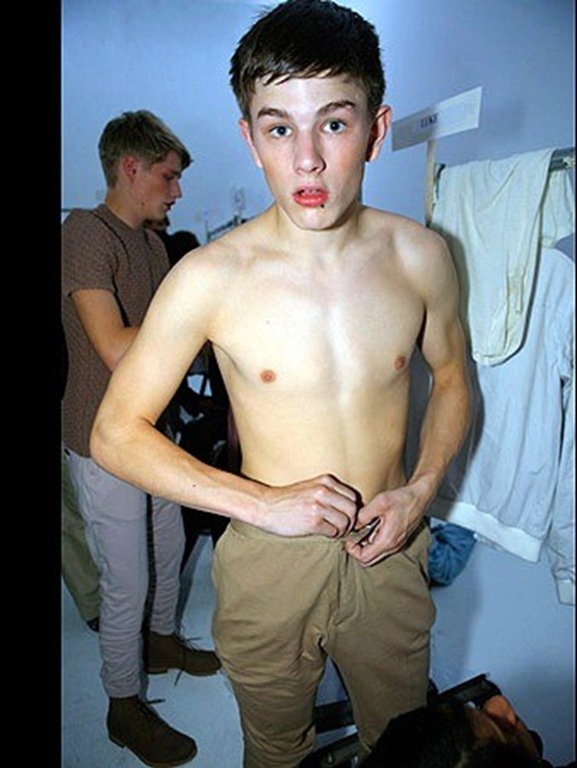 Young teen boy locker room full size
