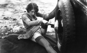 Vintage sexy woman fixing car 960X585 jpeg