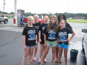 Middle school girls cheerleaders car wash 960X720 jpeg