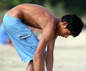 Young teen boy on beach 960X791 jpeg