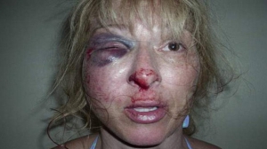 Woman beat up by police officer 960X540 jpeg