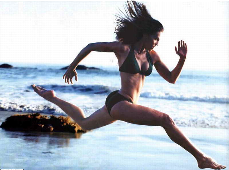Hilary swank running on beach full size