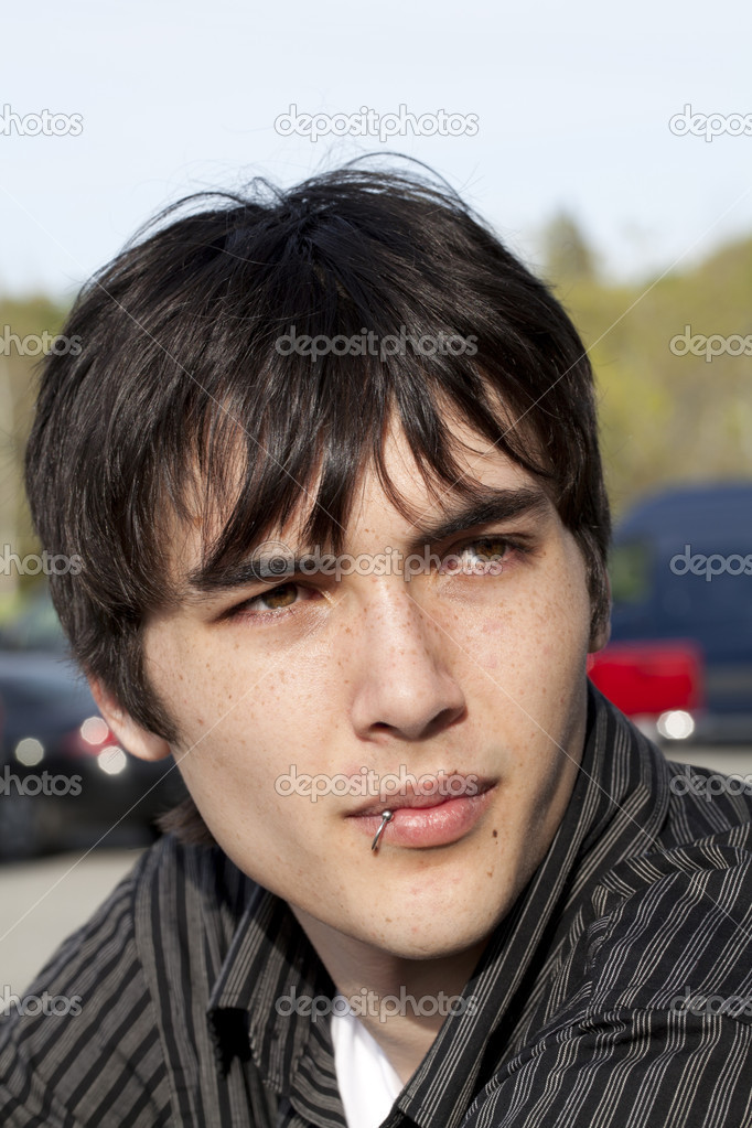Young teen boy with black hair full size