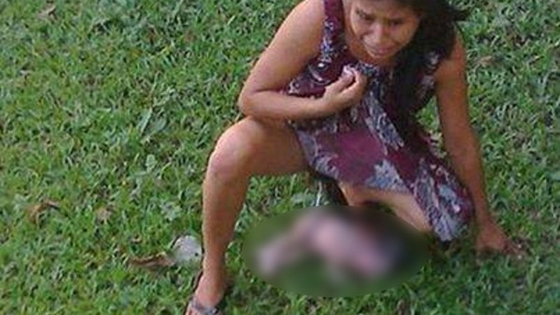Native african women giving birth full size