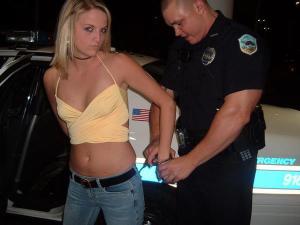Girl arrested handcuffed behind back 600X450 jpeg