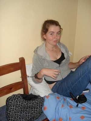 Girl handcuffed bed 600X799 jpeg