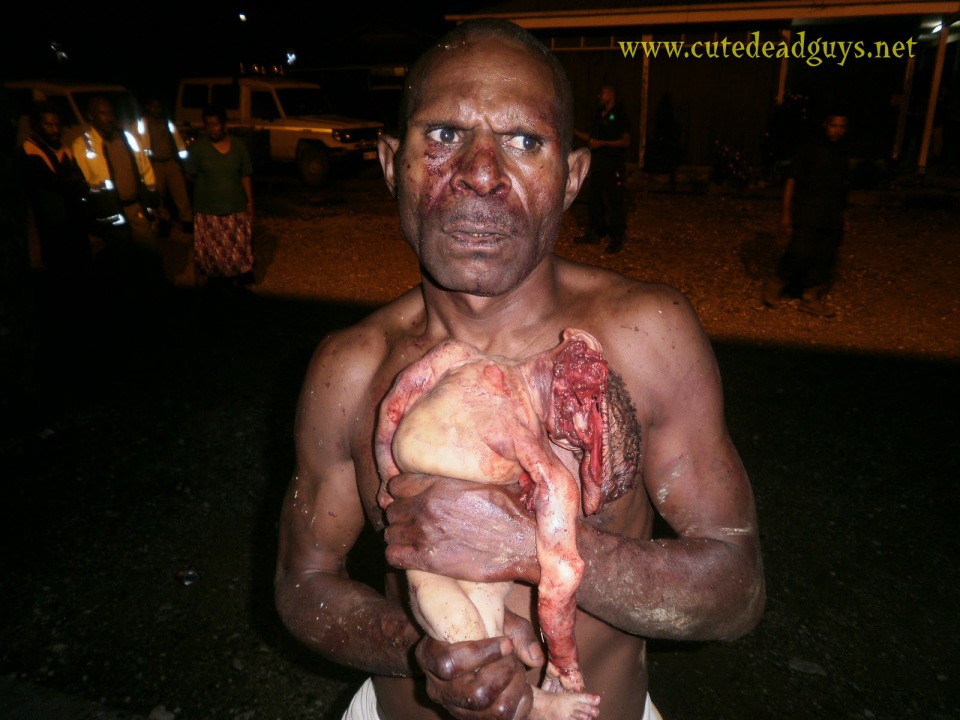 New guinea man eats baby full size