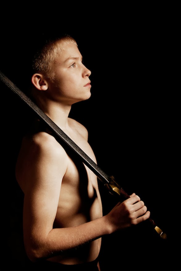 Underage young boy models full size